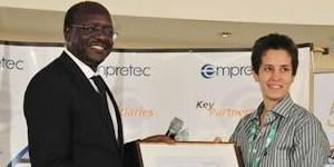 Ms. Jalil Khalifeh receiving award from UNCTAD SG Mukhisa Kituyi 