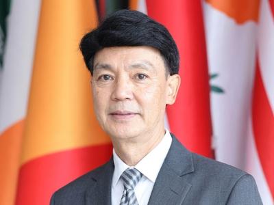 H.E. Mr. Kamalinne Pinitpuvadol