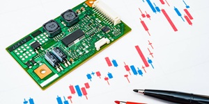 microscheme_laying_on_the_paper_with_a_drawn_chart_and_2_pencils 